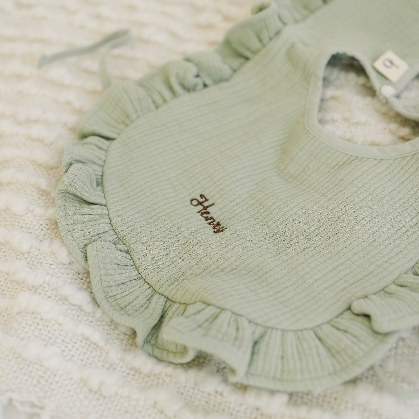 Ruffle Bib- Olive