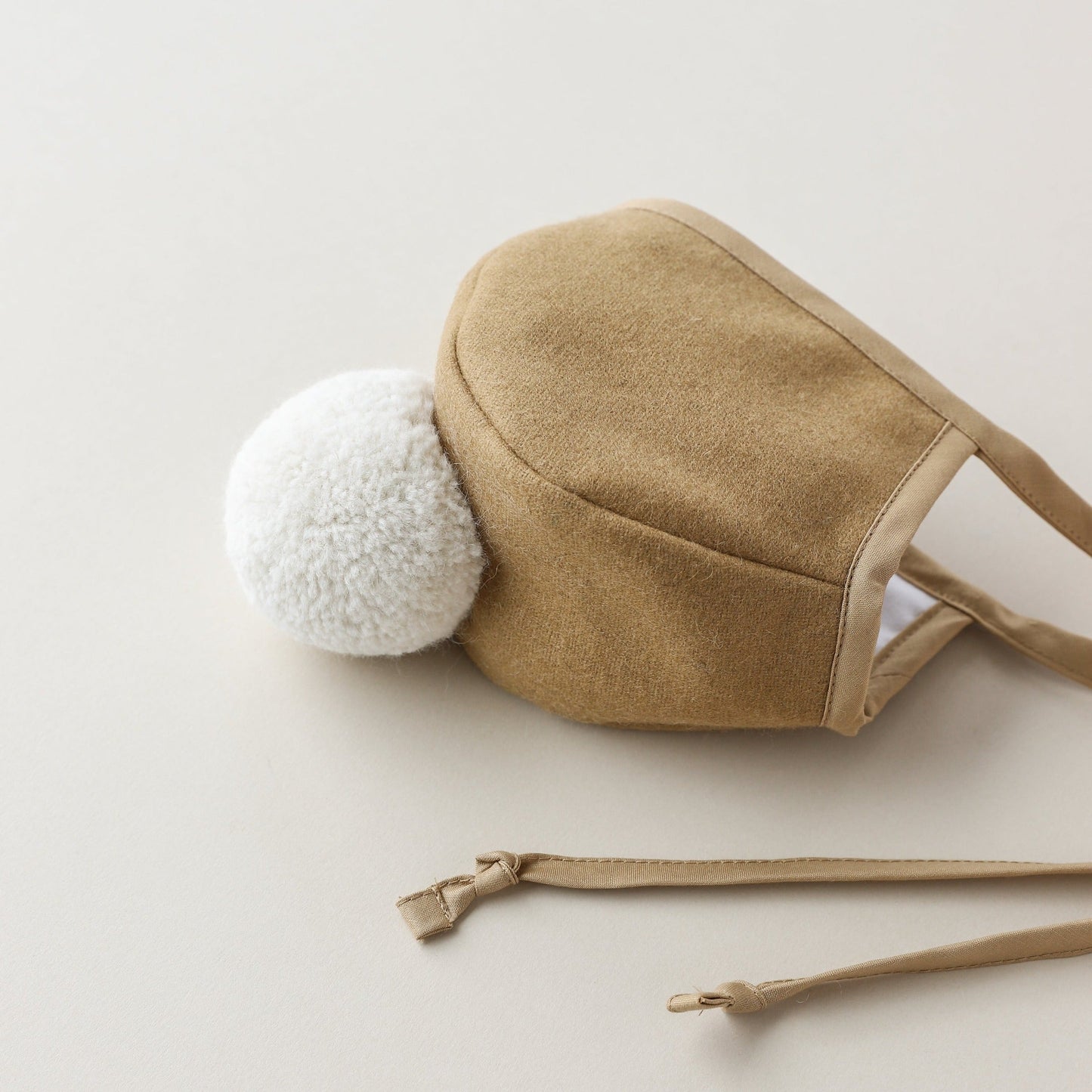 Camel Pom Bonnet Cotton-Lined